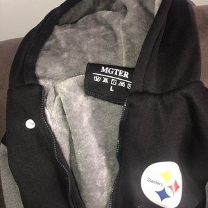 Very nice, comfortable, warm. Zips and has hood.